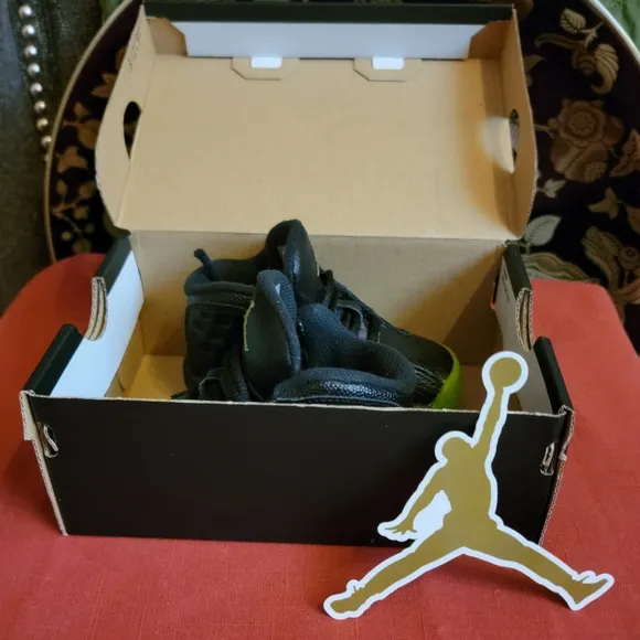 Black High-Top Sneakers with Neon Sole and Metallic Accents