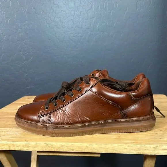 Brown low-top sneakers with smooth leather and sporty style