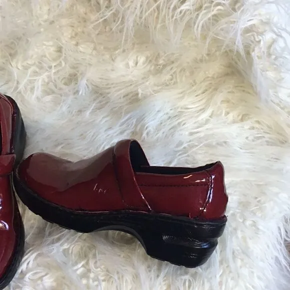 Deep red clog type shoes in size 6 NWOT