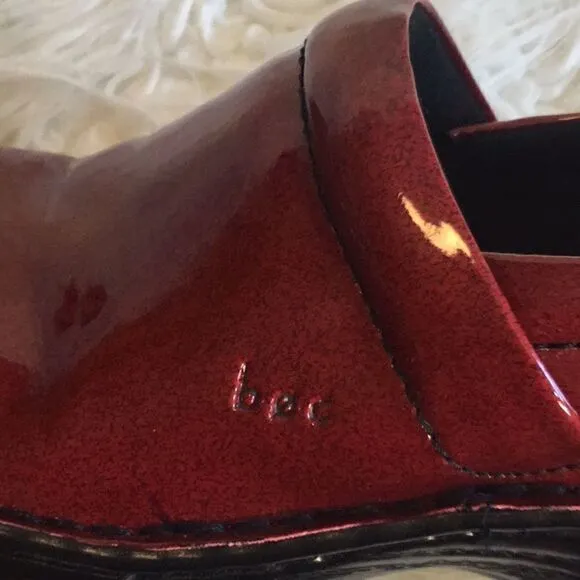 Deep red clog type shoes in size 6 NWOT