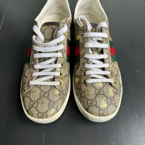 Gucci Brown and Red Sneakers with Iconic Pattern