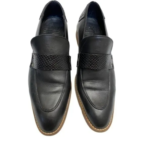 HARDY black leather LOAFERS with a snake skin pattern and almond shape toe.