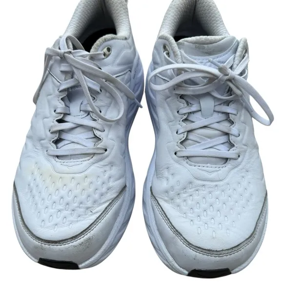 Hoka one/one men’s size 10 white lace up sneakers.