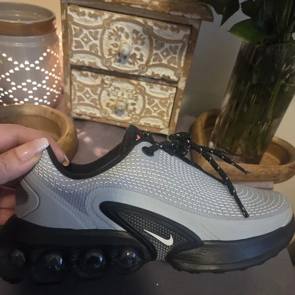 Nike Black and Gray Athletic Shoes with Sleek Design