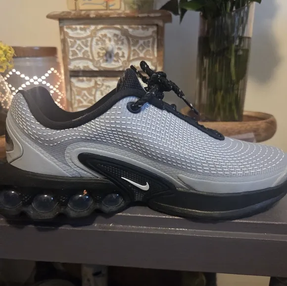 Nike Black and Gray Athletic Shoes with Sleek Design