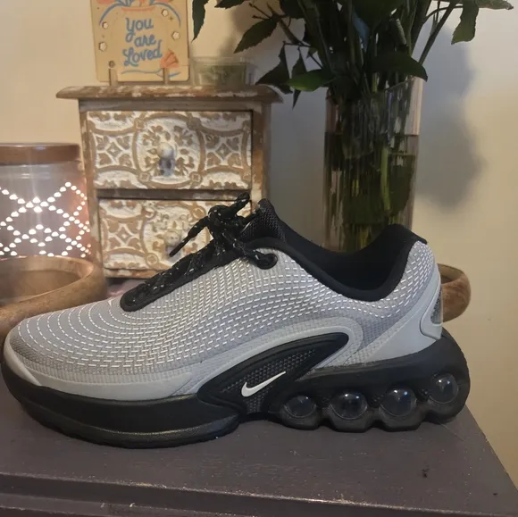 Nike Black and Gray Athletic Shoes with Sleek Design