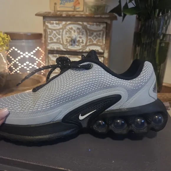 Nike Black and Gray Athletic Shoes with Sleek Design