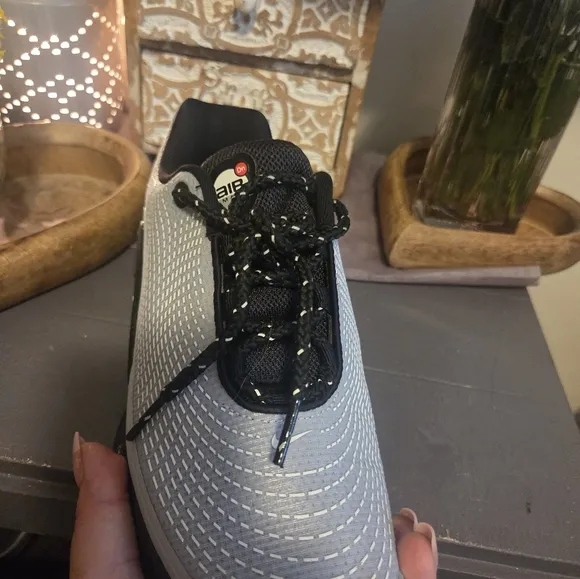 Nike Black and Gray Athletic Shoes with Sleek Design