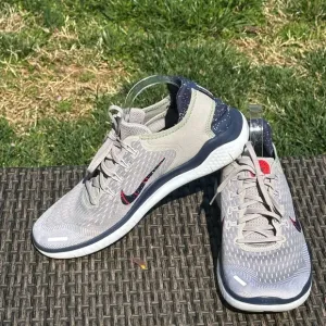 Nike Gray and Red Athletic Shoes with Breathable Mesh