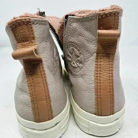 Pink leather Chuck Taylor's 9.5w
