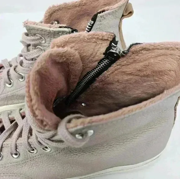 Pink leather Chuck Taylor's 9.5w