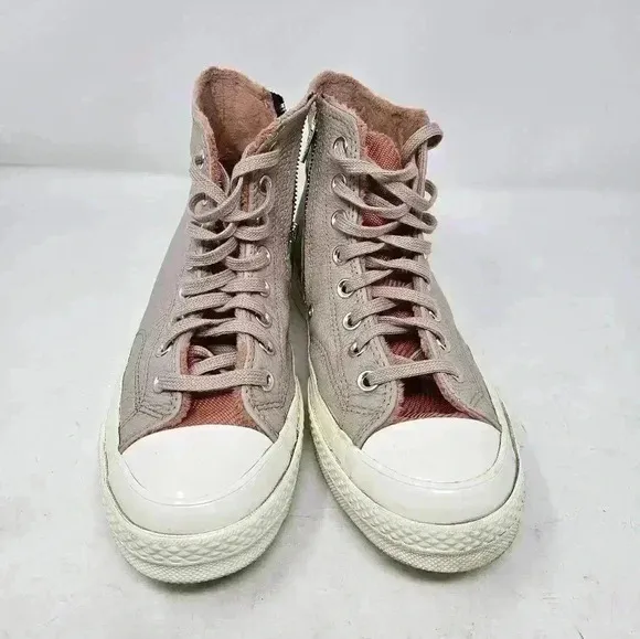 Pink leather Chuck Taylor's 9.5w