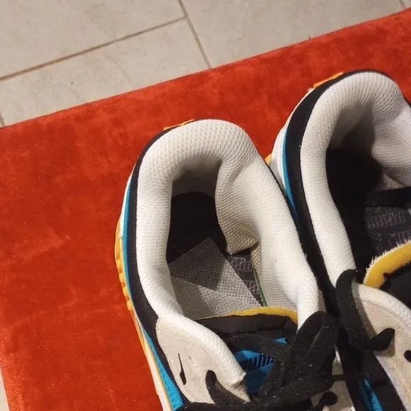 Puma Black and Blue Sneakers with Retro Design