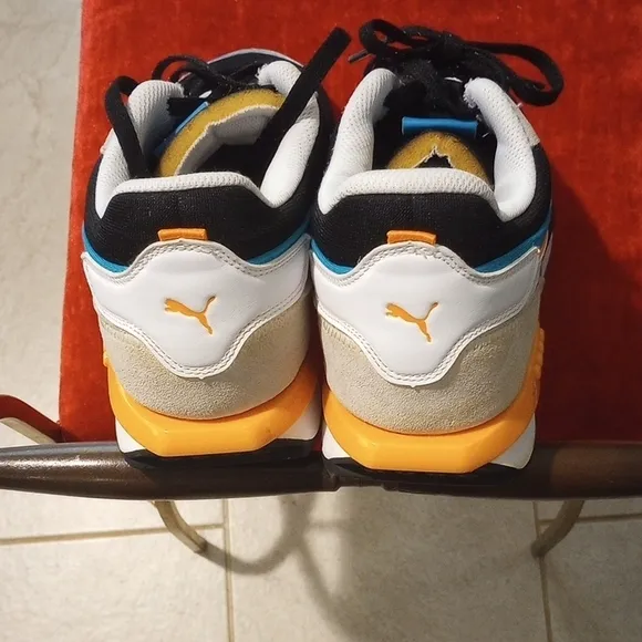 Puma Black and Blue Sneakers with Retro Design