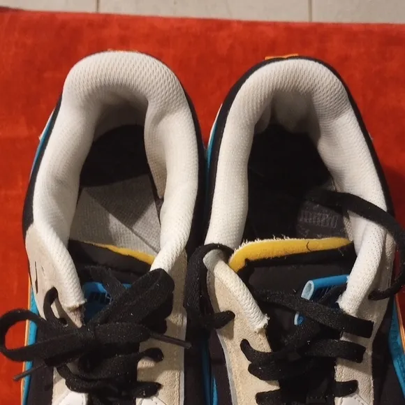 Puma Black and Blue Sneakers with Retro Design