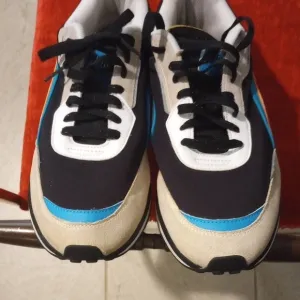 Puma Black and Blue Sneakers with Retro Design