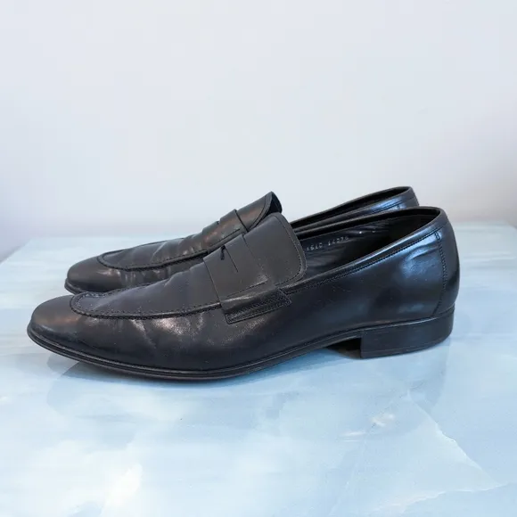 Salvatore Ferragamo black leather shoes