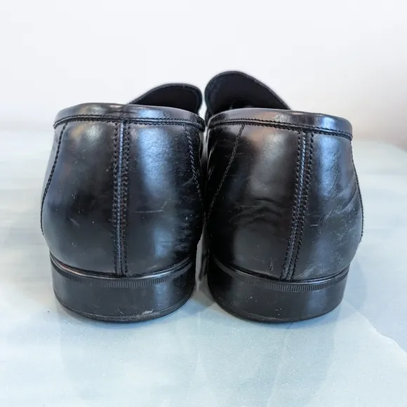 Salvatore Ferragamo black leather shoes