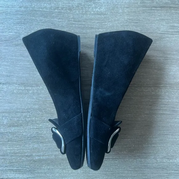 Stuart Weitzman woman’s black suede Bucksome wedge shoes