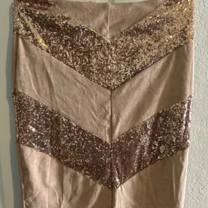 Tan skirt above the knee