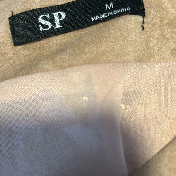 Tan skirt above the knee