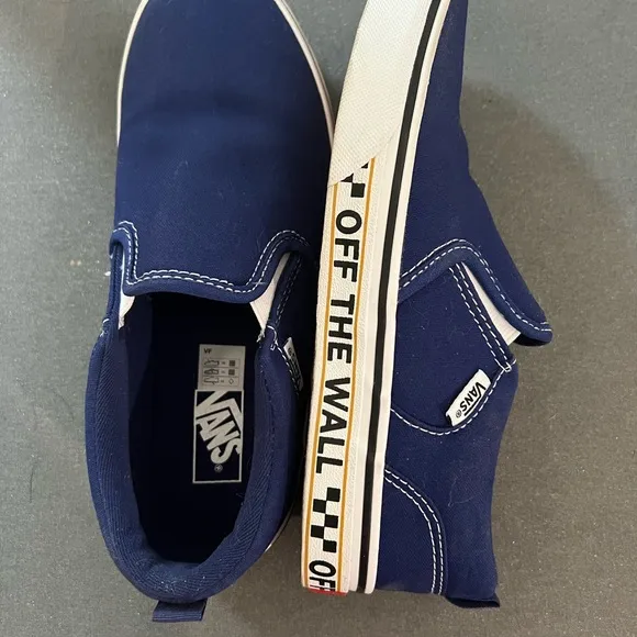 Vans Original Slip-on Skater shoes.  Fits youth 5/womens 6.  Navy blue.