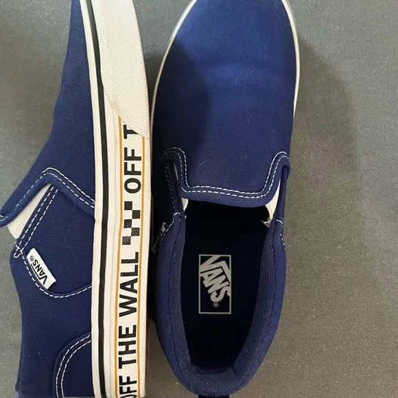 Vans Original Slip-on Skater shoes.  Fits youth 5/womens 6.  Navy blue.